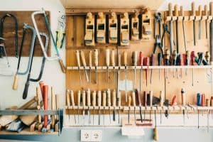 a-garage-contains-shovels-and-rakes-need-to-move