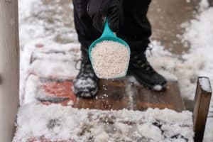 applying-salt-on-snow
