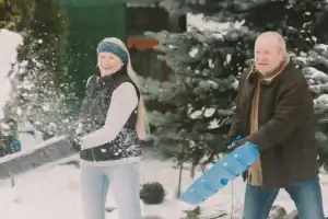 senior-citizens-shoveling-snow